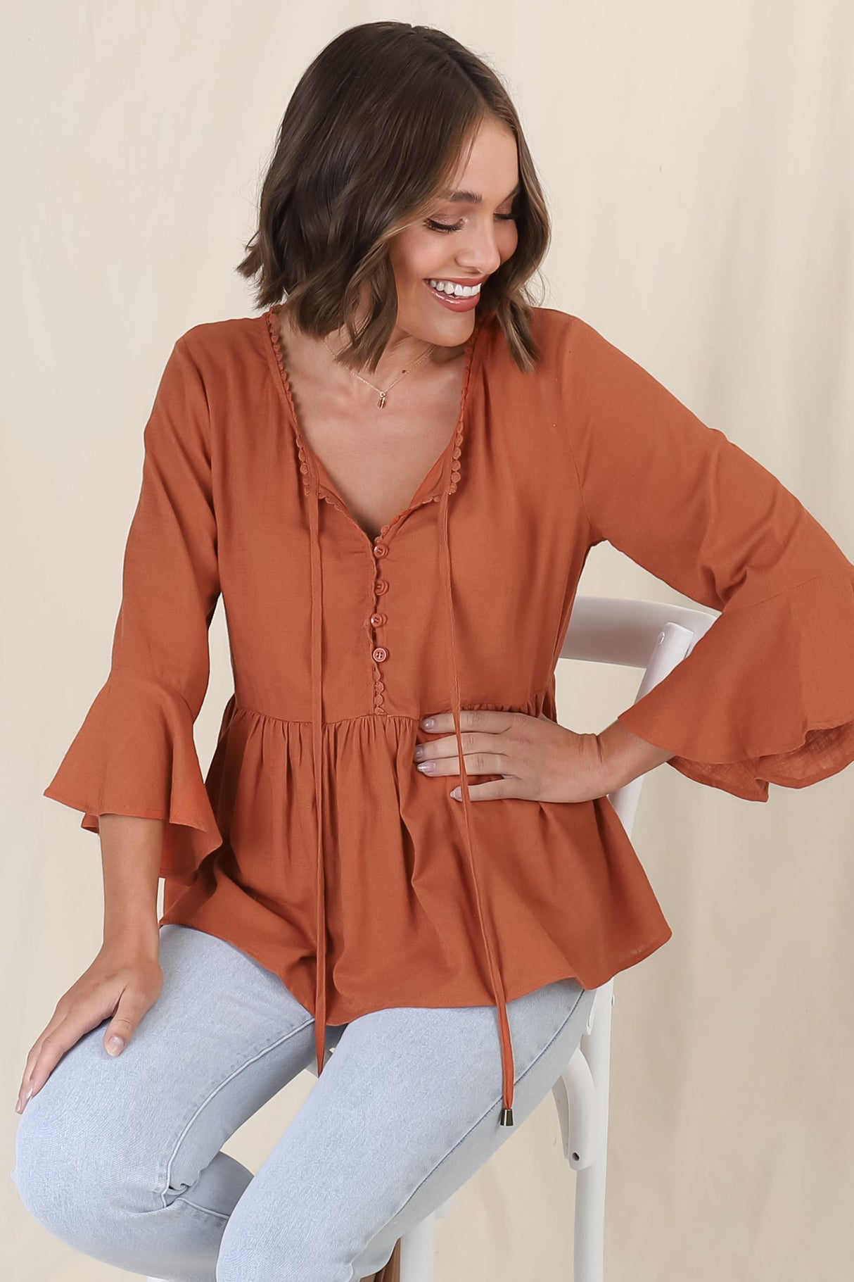 Sandy Top - Crochet Neckline Buttoned Bodice Flare Sleeve Smock Top in Tan