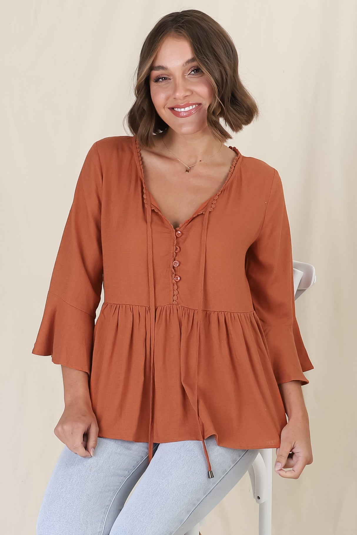 Sandy Top - Crochet Neckline Buttoned Bodice Flare Sleeve Smock Top in Tan