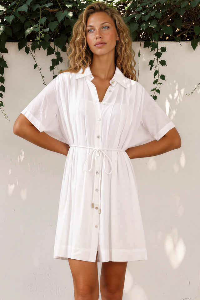 Model wearing Santara Mini Dress in White from Salty Crush
