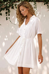 Model wearing Santara Mini Dress in White from Salty Crush
