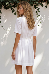 Model wearing Santara Mini Dress in White from Salty Crush