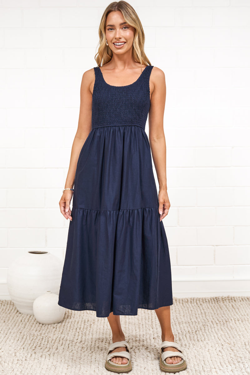 Sarlie spring midi dress in navy cotton linen with shirred bodice and tiered skirt