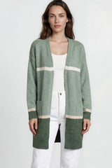 Model wearing Saylor Cardigan in Green from Salty Crush