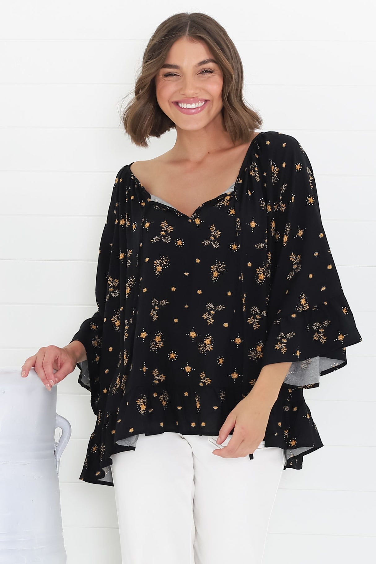 Shilo Top - V-Neck Smock Top with 3/4 Flute Sleeves in Melany Print Black