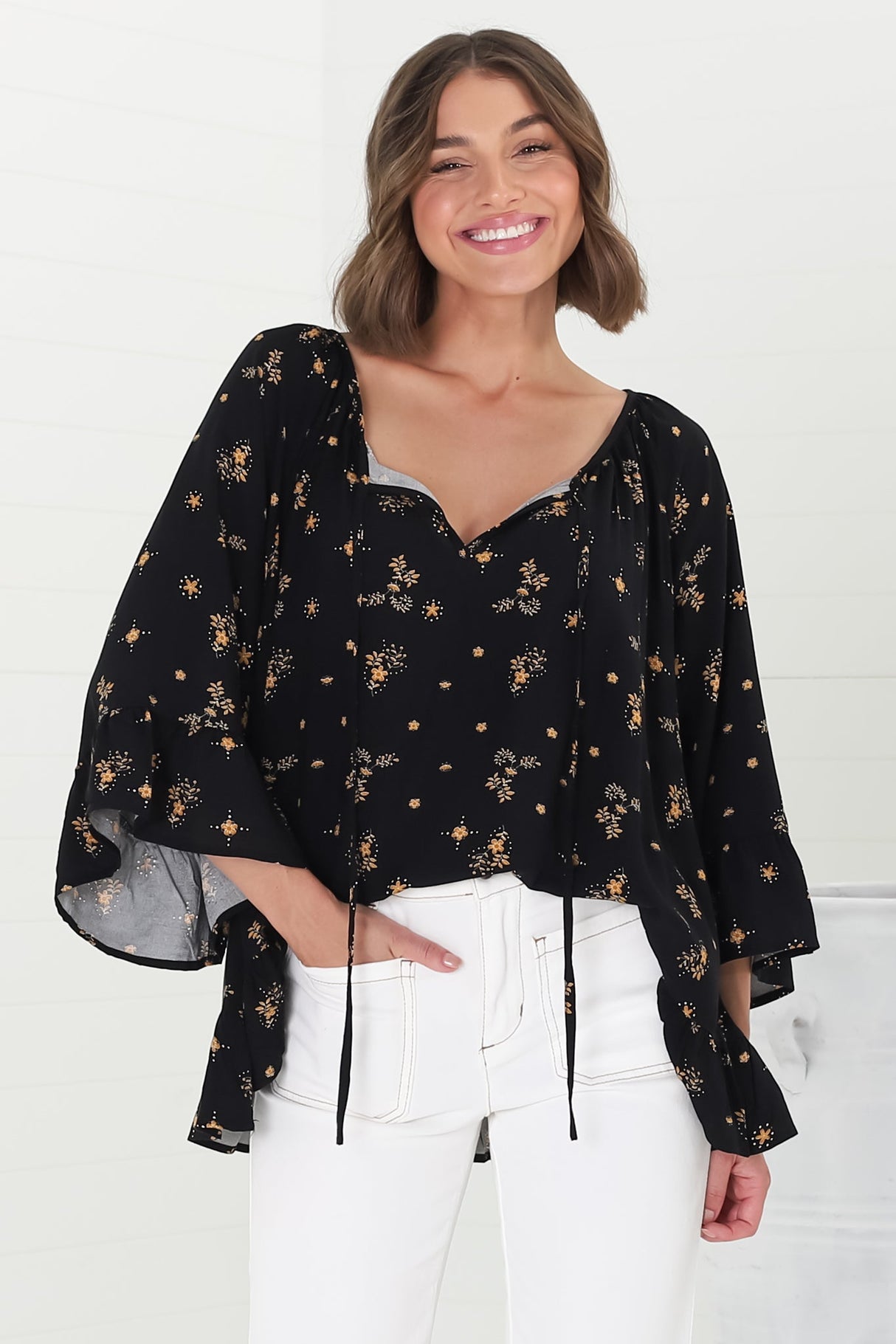 Shilo Top - V-Neck Smock Top with 3/4 Flute Sleeves in Melany Print Black