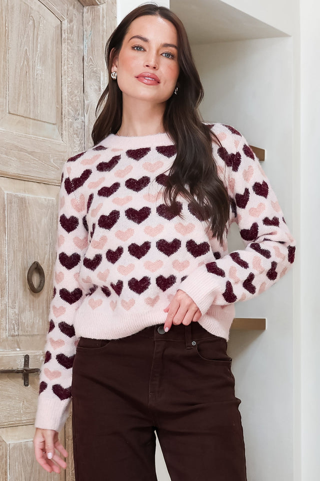 Model wearing Skye Jumper in Pink from Salty Crush