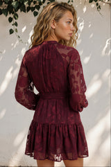 Model wearing Solange Mini Dress in Wine from Salty Crush