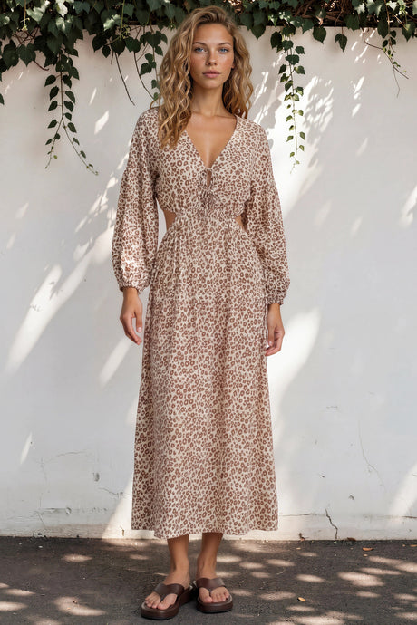 Model wearing Sona Midi Dress in Leo Lily Print from Salty Crush
