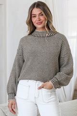 Model wearing Stellan Jumper in Cream/Chocolate from Salty Crush