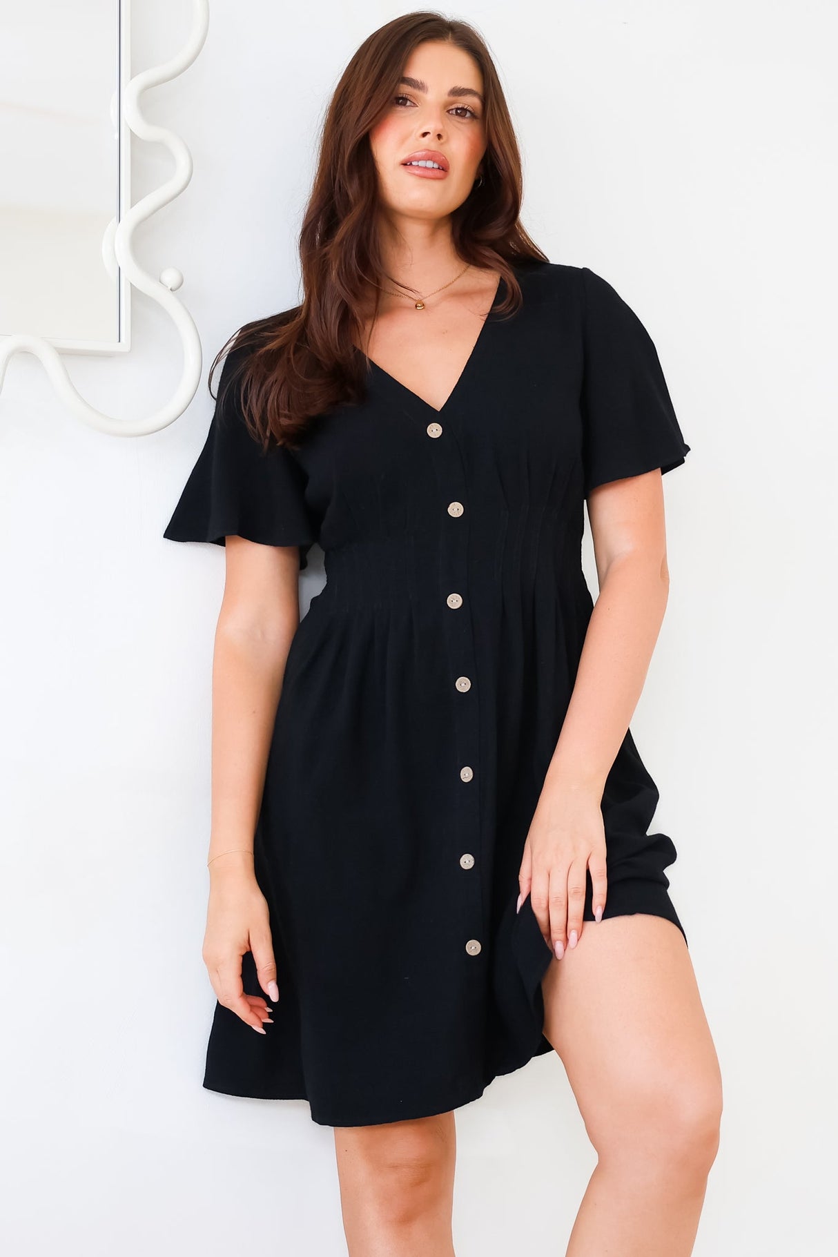 Stellar Mini Dress - Flutter Sleeve A-Line Dress with Pin Tuck Waist Detail in Black
