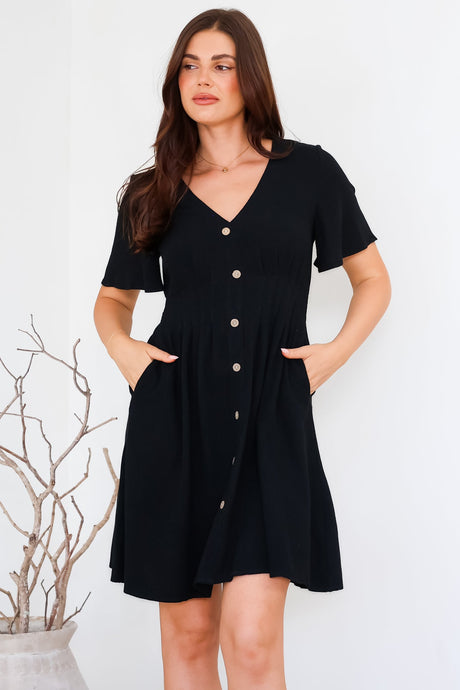 Stellar Mini Dress - Flutter Sleeve A-Line Dress with Pin Tuck Waist Detail in Black