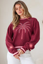 Model wearing Sunnie Jumper in Wine from Salty Crush