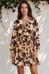 Model wearing Sybil Mini Dress in Leopard Print from Salty Crush