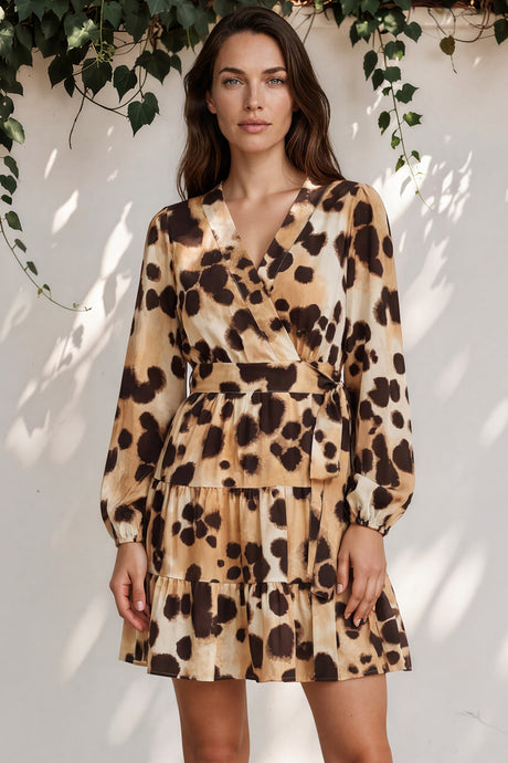 Model wearing Sybil Mini Dress in Leopard Print from Salty Crush