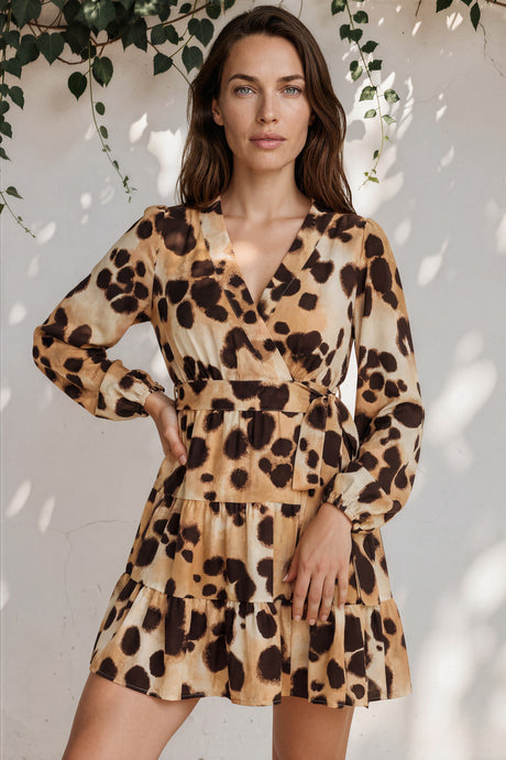 Model wearing Sybil Mini Dress in Leopard Print from Salty Crush