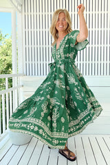 JAASE - Taurus Maxi Dress: Flutter Cap Sleeve Deep V Neck Handkerchief Hem Dress with Matching Waist Tie in Kiva Print