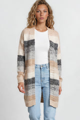 Model wearing Tess Cardigan in Beige from Salty Crush