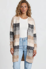 Model wearing Tess Cardigan in Beige from Salty Crush