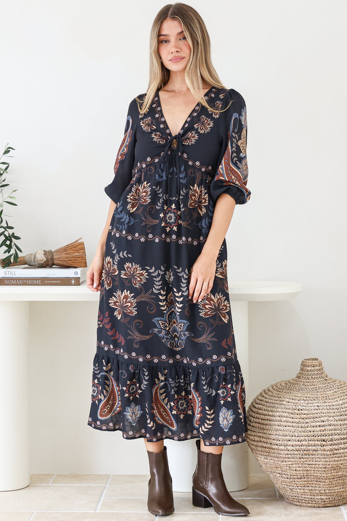 Model wearing Thanya Midi Dress in Magah Print Navy from Salty Crush