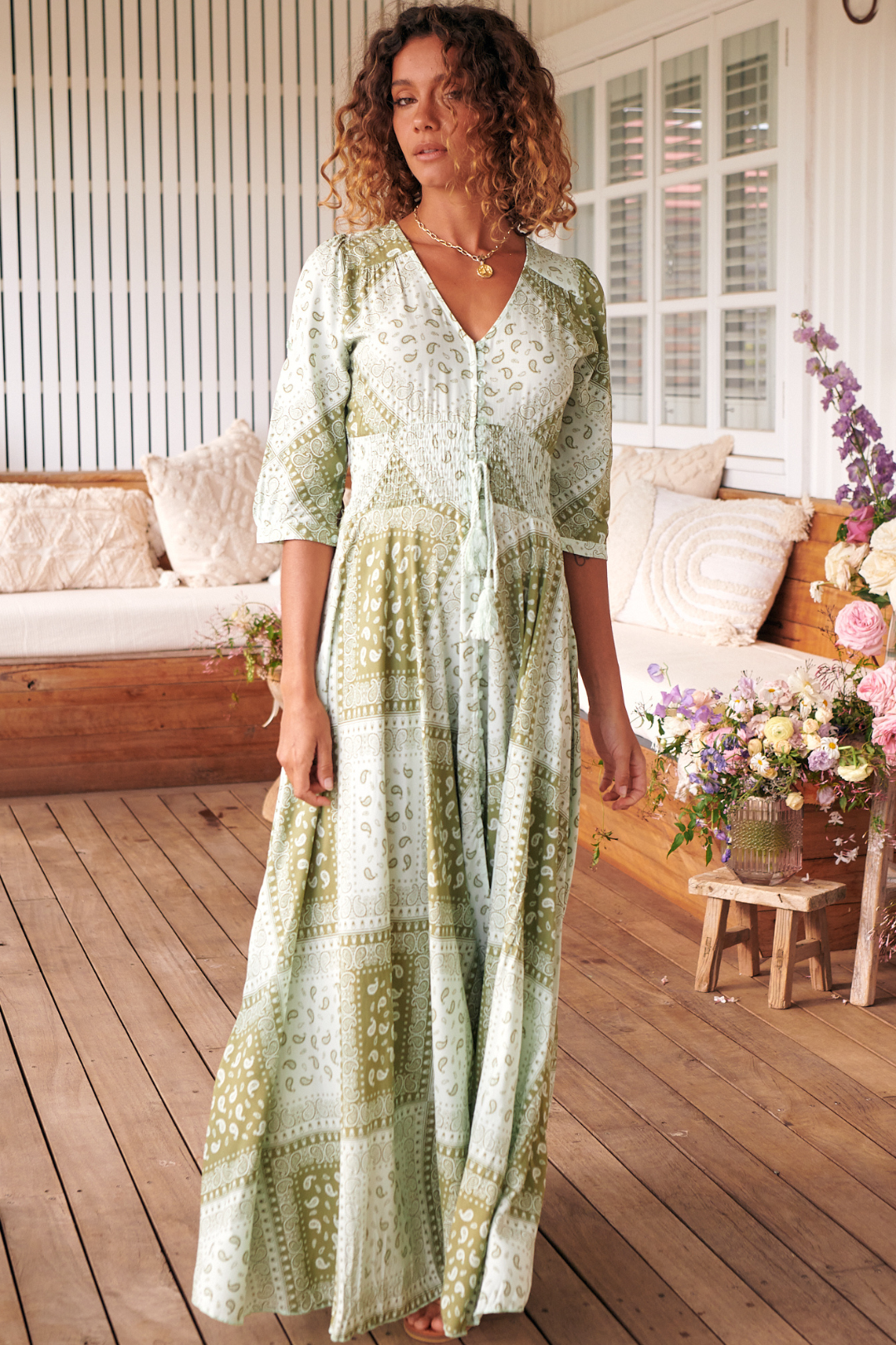 JAASE - Indiana Maxi Dress: Lace Back Shirred Waist A Line Dress with Handkercheif Hemline in Thyme Print