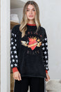 Model wearing Wandering Heart Long Sleeve Tee in Black from Salty Crush
