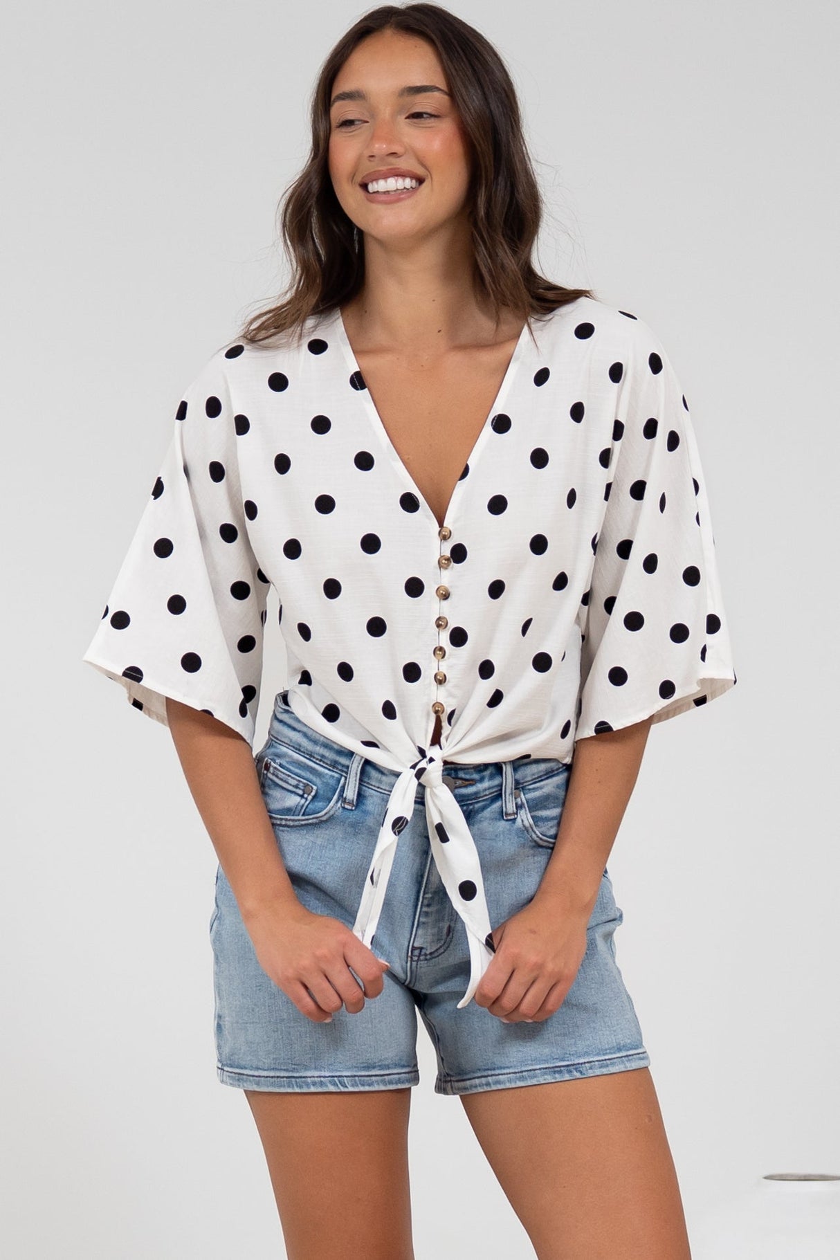 Waverly Top - V-Neck Button Down Top with Tie at Waist in Black Polka Dot Print