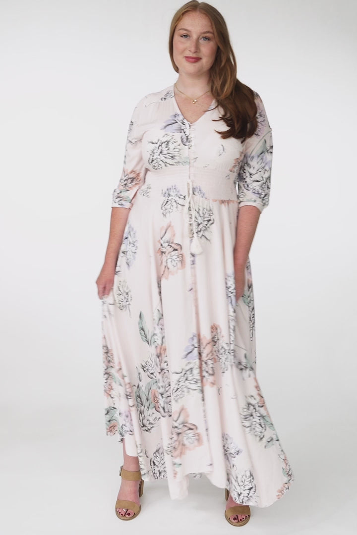 JAASE - Indiana Maxi Dress: Lace Back Shirred Waist A Line Dress with Handkercheif Hemline in Blooming Bouquet Print