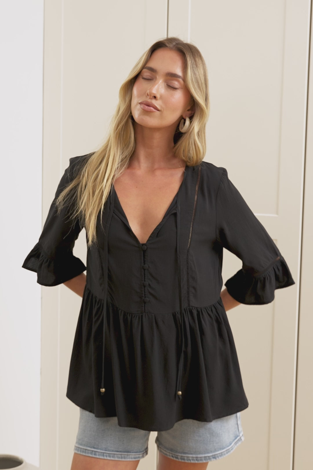 Dustin Top - Tie Neck Button Bodice Peplum Top with Frill Cuff 3/4 Sleeves in Black