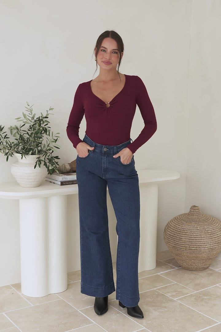 Roxana Top - Ribbed V Neck Long Sleeve Top with Gold Metal Accent in Wine