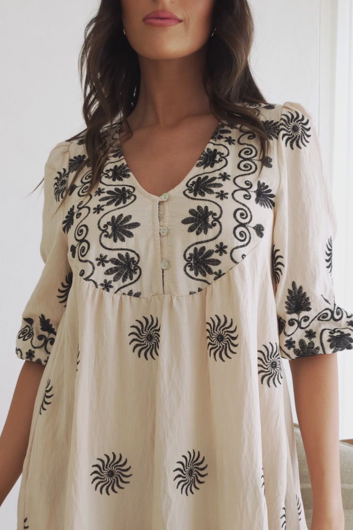Patty Mini Dress - V-Neck Embroidered Babydoll Dress with 3/4 Sleeves in Solsana Print in Black