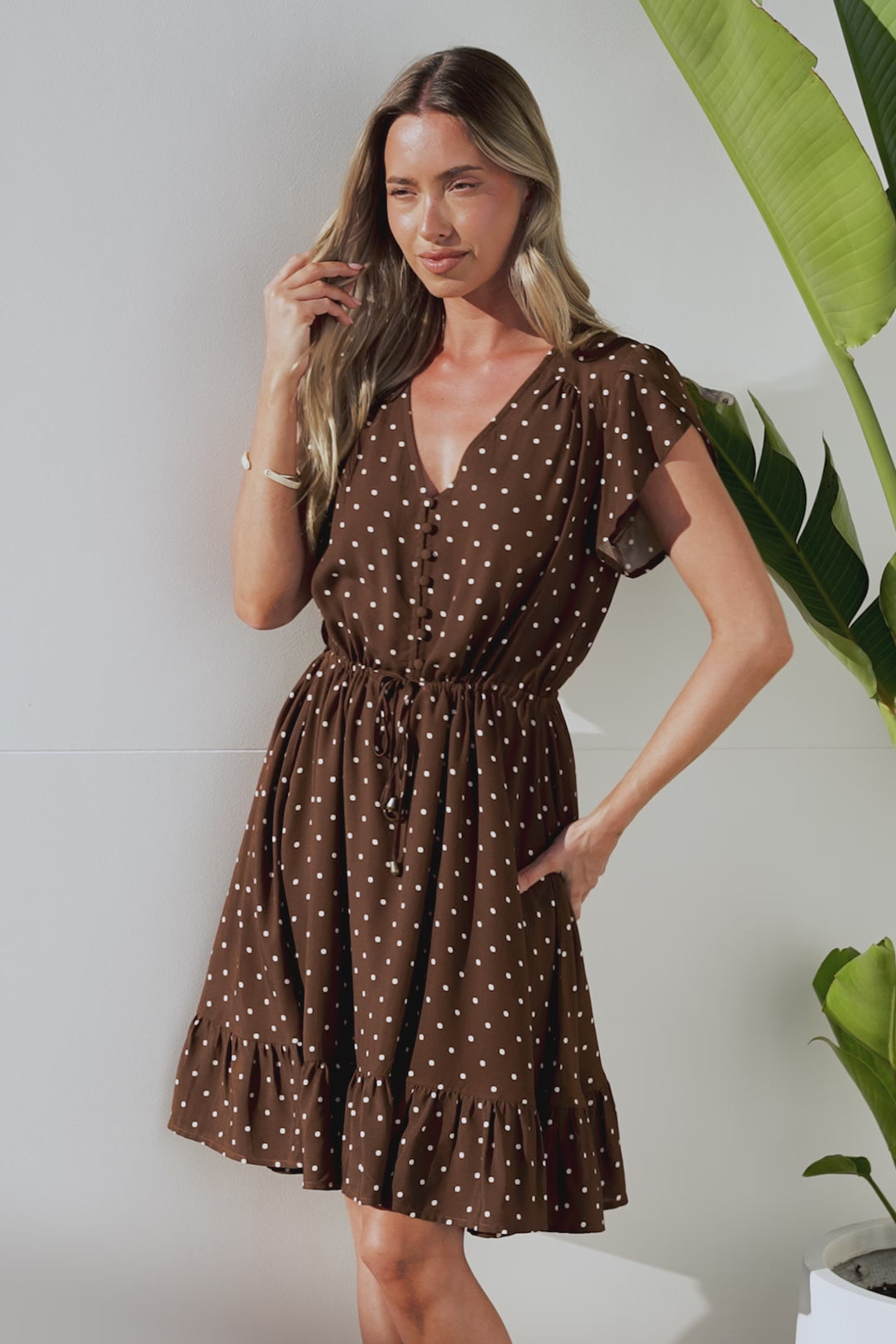 Hetta Mini Dress - V Neck Dress with Adjustable Tie Waist and Flutter Cap Sleeves in Mally Spot Print Brown