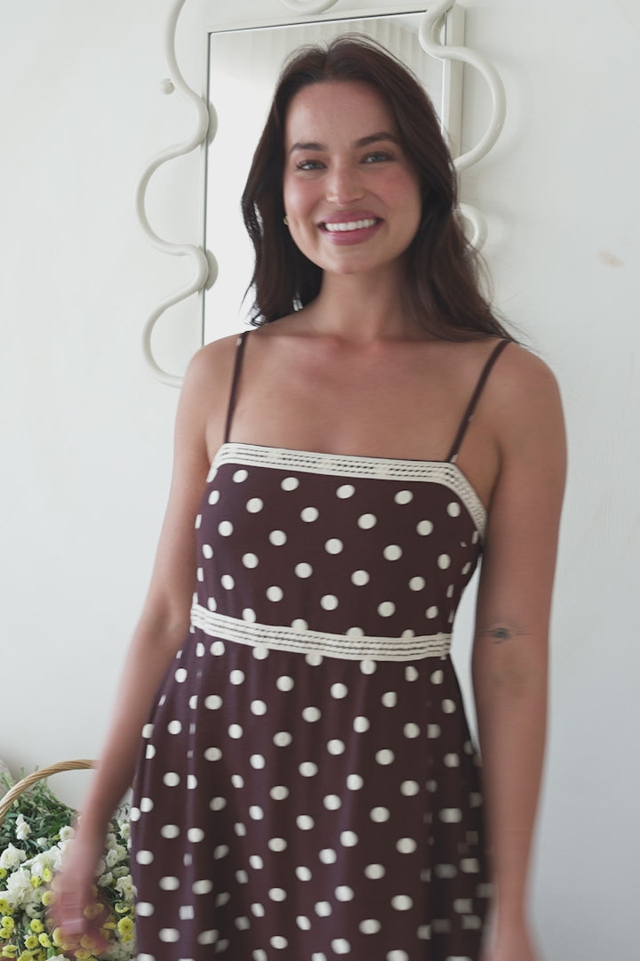 Model wearing Novalie Midi Dress in Polka Chocolate from Salty Crush