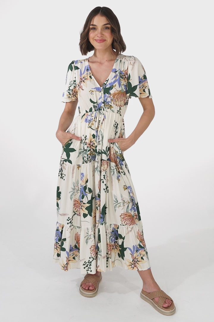 Adhira Maxi Dress - Buttoned Bodice A-Line Dress with Flute Sleeves in Raven Print White