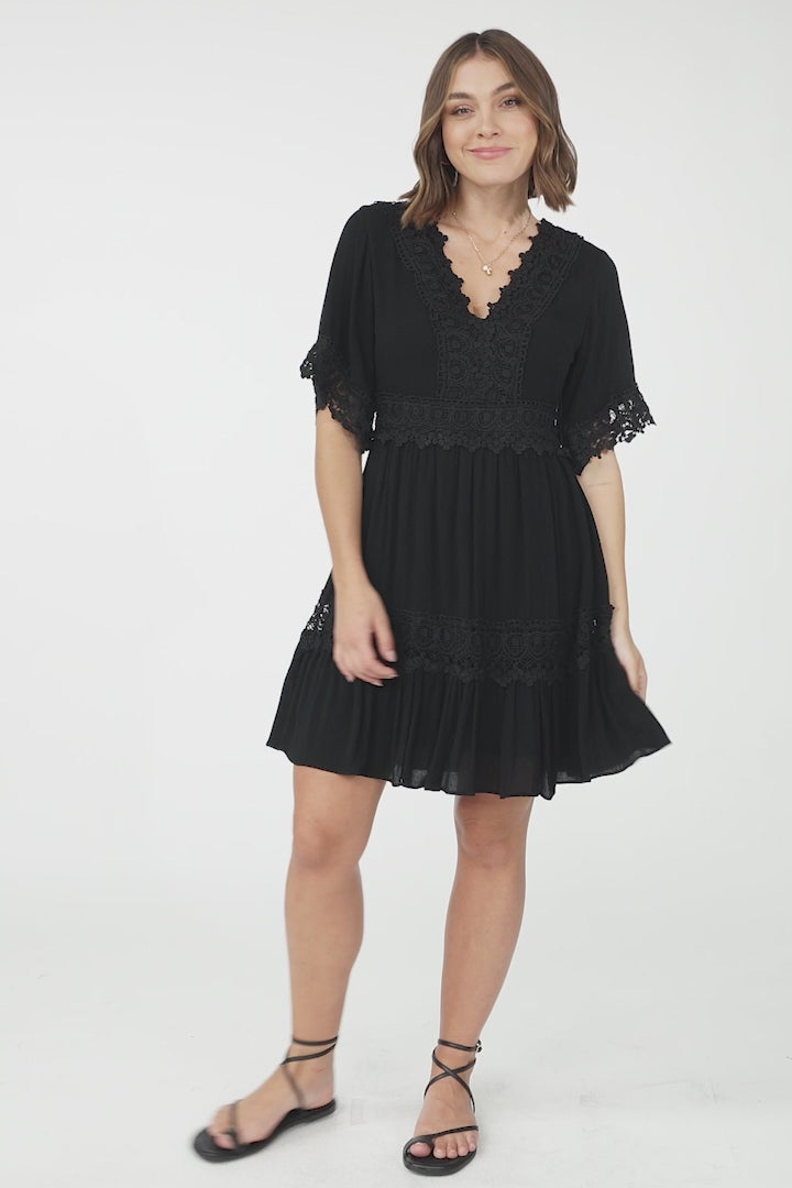 Leelie Mini Dress - Lace Embellished Tiered Dress with Bell Sleeves in Black