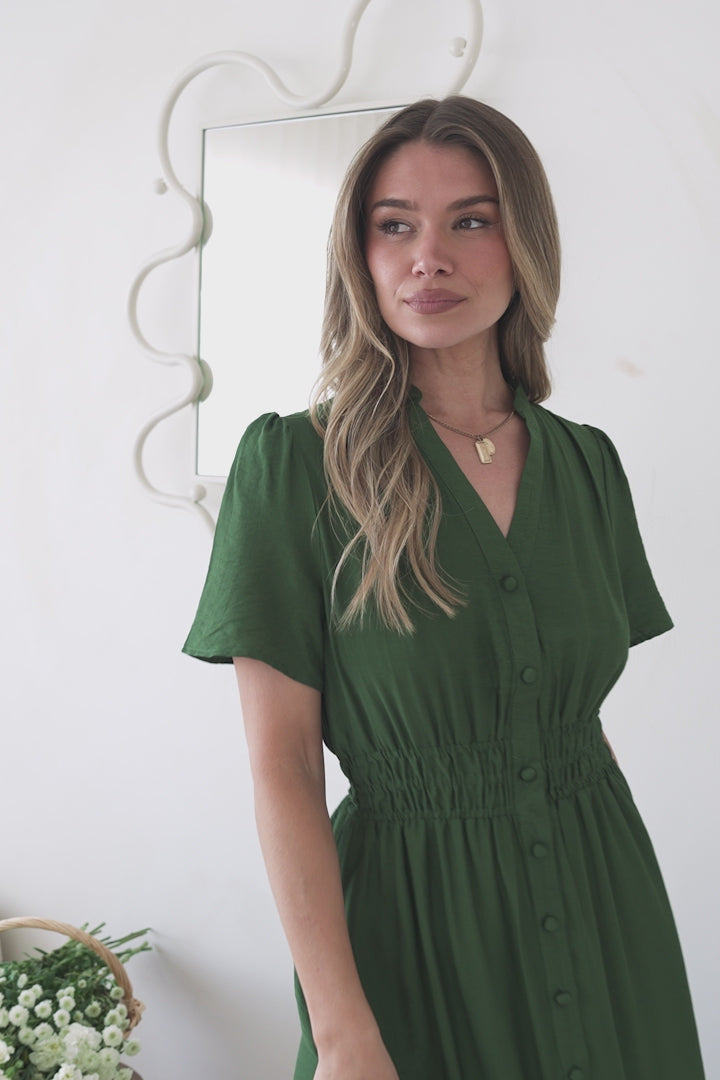 Model wearing Paloma Midi Dress in Emerald from Salty Crush