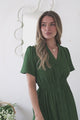 Model wearing Paloma Midi Dress in Emerald from Salty Crush