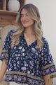 JAASE - Gabriella Top: Mandarin Collar Deep V Neck Crochet Trim Top in Wild Indigo Print
