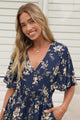 Model wearing Balenca Mini Dress in Salvia Print Navy from Salty Crush