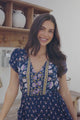 JAASE - Lizzie Mini Dress: Butterfly Cap Sleeve Button Down Dress with Pockets in Wild Indigo Print