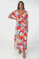 Cartia Maxi Dress - Cross Over Bodice Batwing Sleeves with Tie Detail Dress in Graphic Floral Print