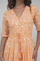 JAASE - Indiana Maxi Dress: Lace Back Shirred Waist A Line Dress with Handkerchief Hemline in Peach Island Print