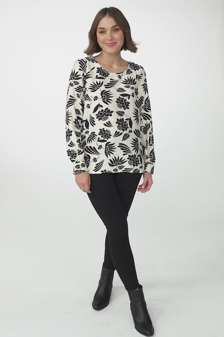 Fintra Top - Zipper Detail Long Sleeve Top in Black Kacia Print