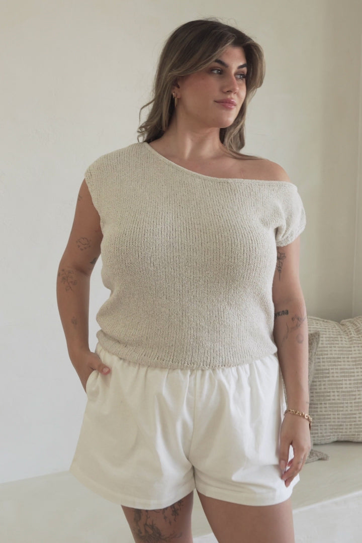 Mariah Knit Top - Sleeveless Asymmetric Neckline Top with Ribbed Hem in Oat