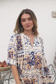 Model wearing Evie Mini Dress in Alphy Print from Salty Crush