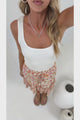 Walker Mini Skirt - High Waisted Elasticated Mini Skirt in Marigold Magic Print