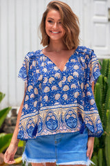 JAASE - Fisico Top: High V Neck Slouchy Blouse with Crochet Trim Hemline in Camelia Print