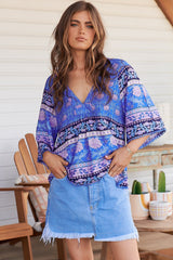 JAASE - Gabriella Top: Mandarin Collar Deep V Neck Crochet Trim Top in Bluey Print