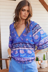 JAASE - Gabriella Top: Mandarin Collar Deep V Neck Crochet Trim Top in Bluey Print