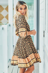 JAASE - Celine Mini Dress: V Neck Elasticated Waist Circle Hemline Dress in Queen of the Night Print