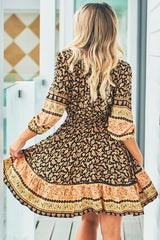 JAASE - Celine Mini Dress: V Neck Elasticated Waist Circle Hemline Dress in Queen of the Night Print